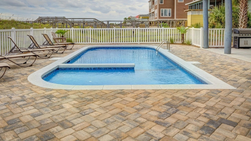 Pool installer checking plans